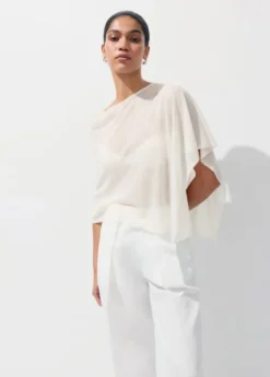 Asymmetrical knitted cape
