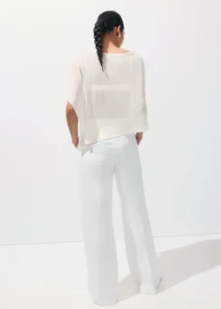Asymmetrical knitted cape