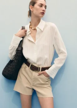 Denim shorts with frayed hem